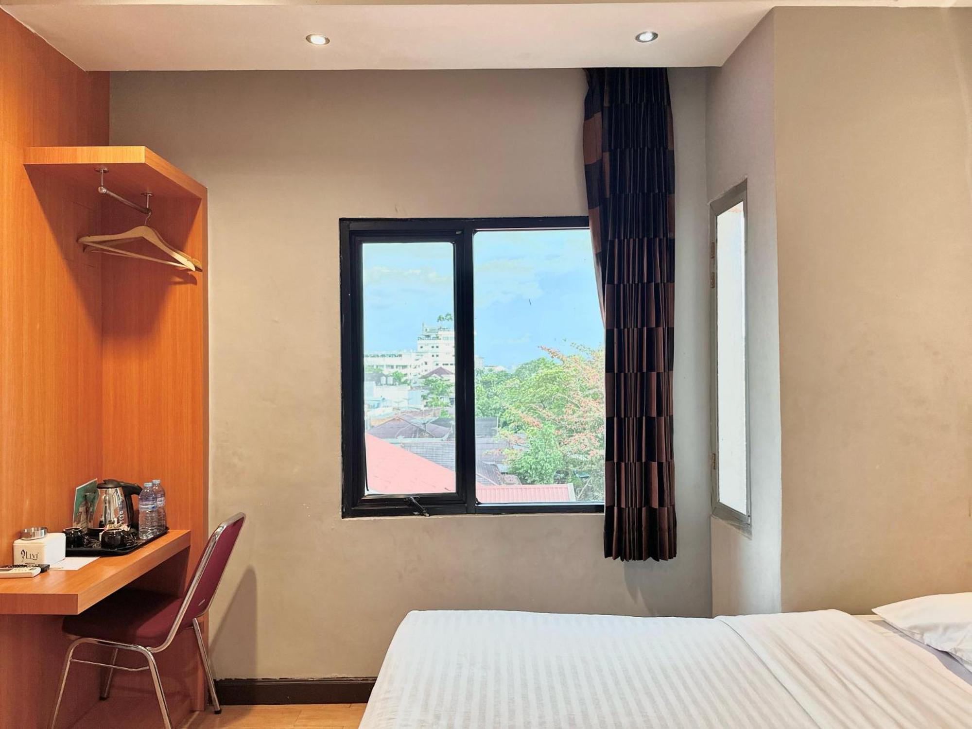 My Home Hotel Pontianak Extérieur photo